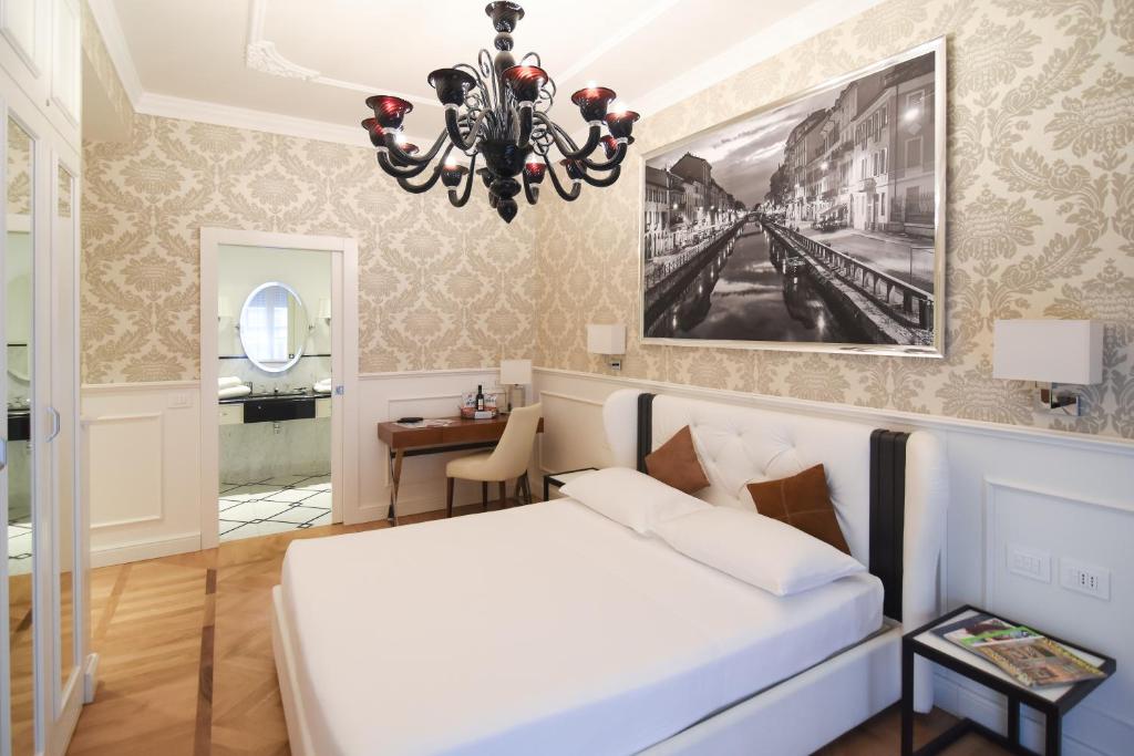 Posteľ alebo postele v izbe v ubytovaní Duomo Rooms