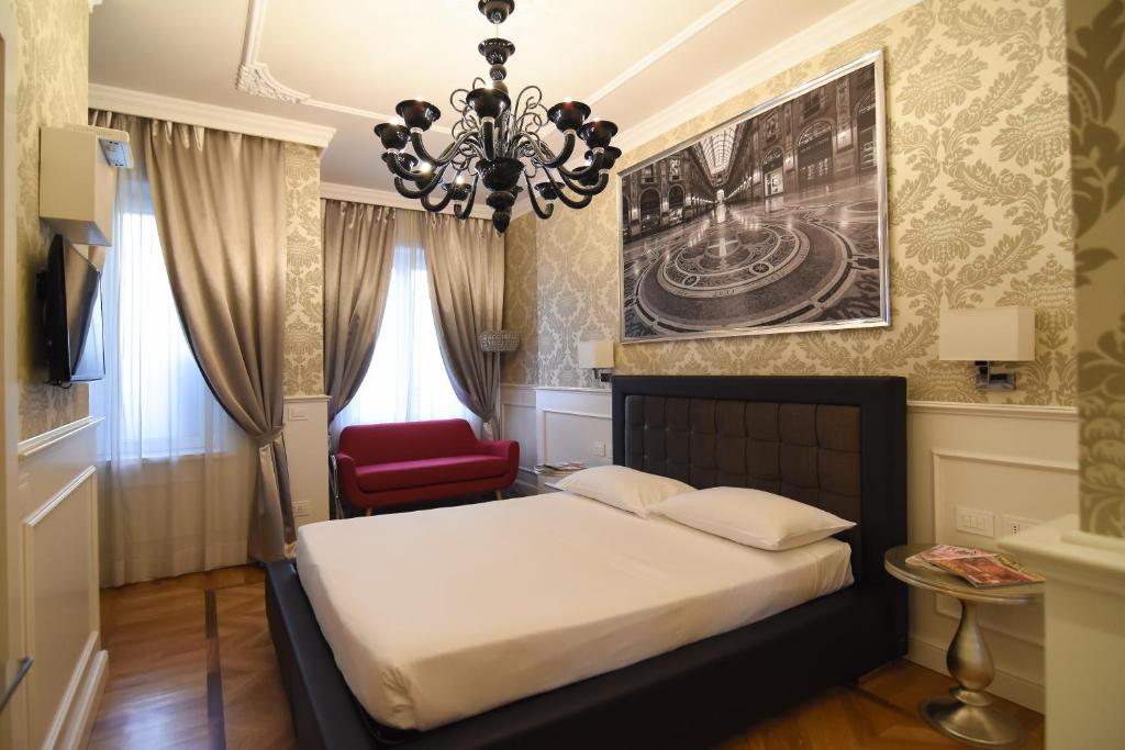 Posteľ alebo postele v izbe v ubytovaní Duomo Rooms