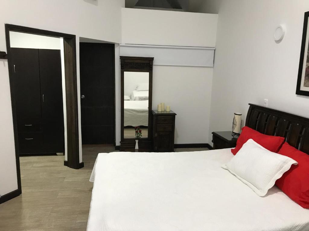 Postel nebo postele na pokoji v ubytování Hospedaje Solymar Sarie Bay