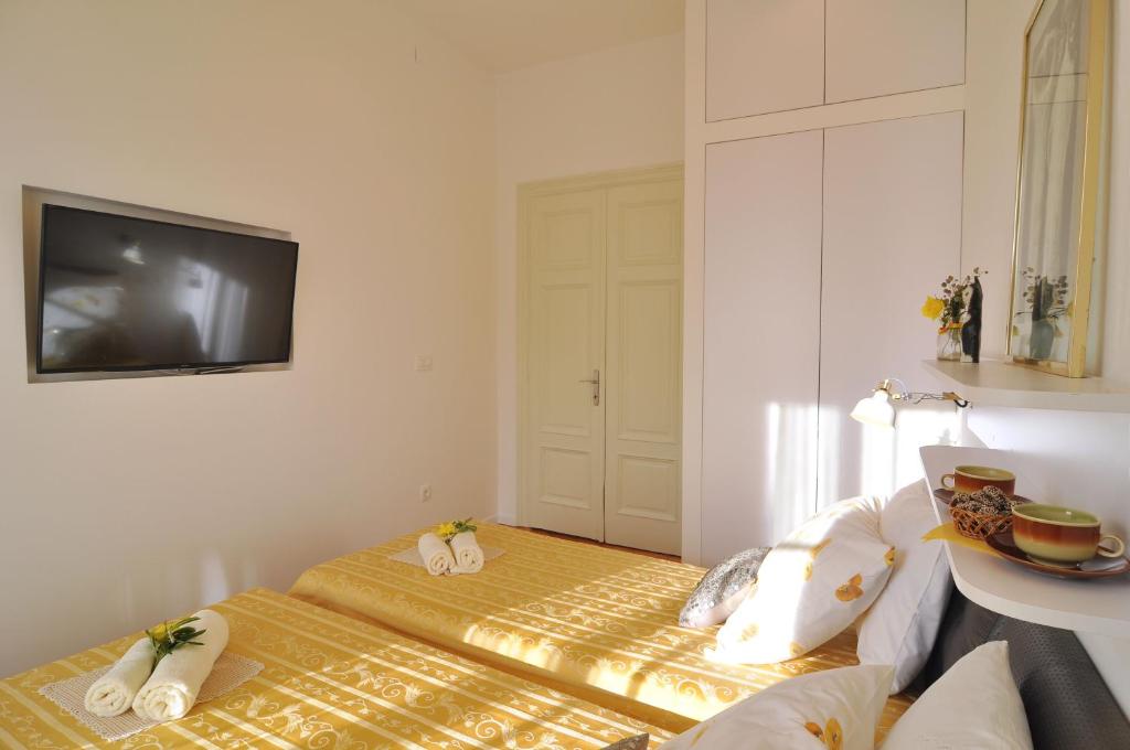 Posteľ alebo postele v izbe v ubytovaní Apartment Barbara Centrum