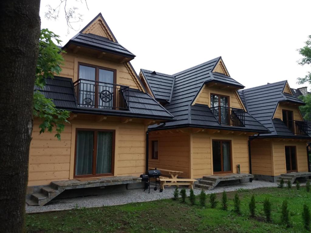 a house with a metal roof on top of it at Sebahouse in Zakopane