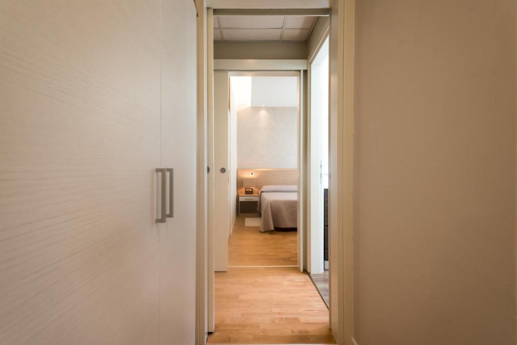 Postel nebo postele na pokoji v ubytování Hotel Eurovil Garni