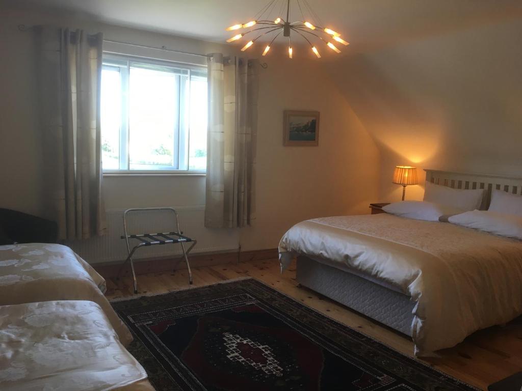 Postel nebo postele na pokoji v ubytování Forest Park House B&B