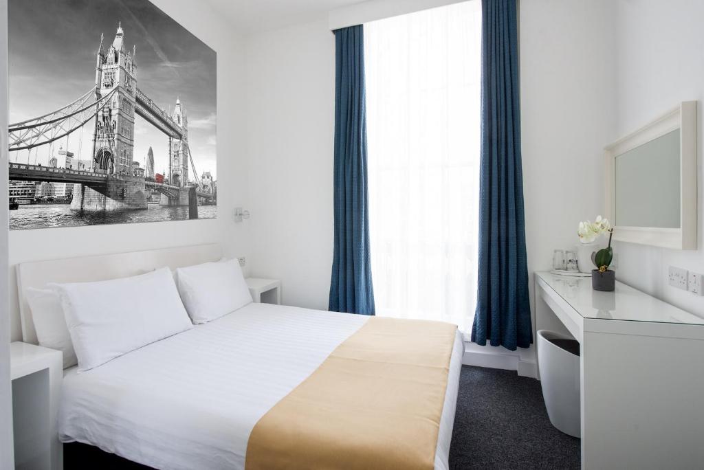 Letto o letti in una camera di Hotel Meridiana