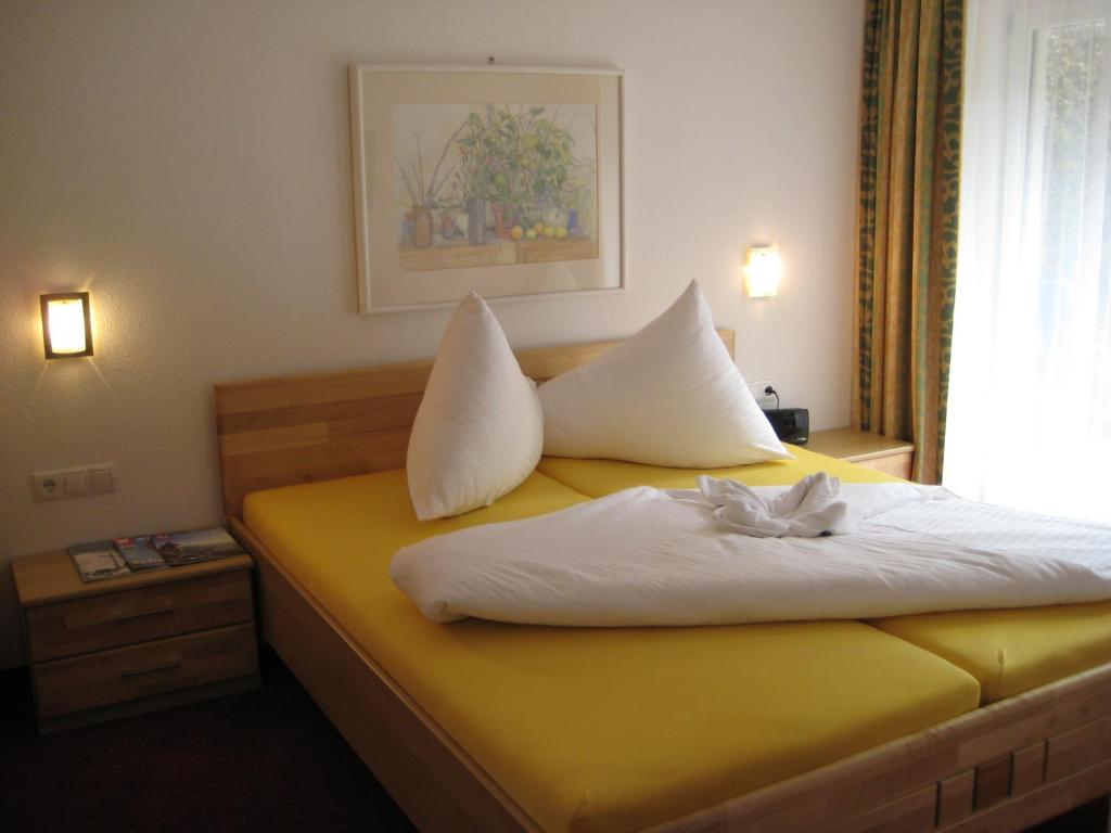 Postel nebo postele na pokoji v ubytování Chalet Bernegg