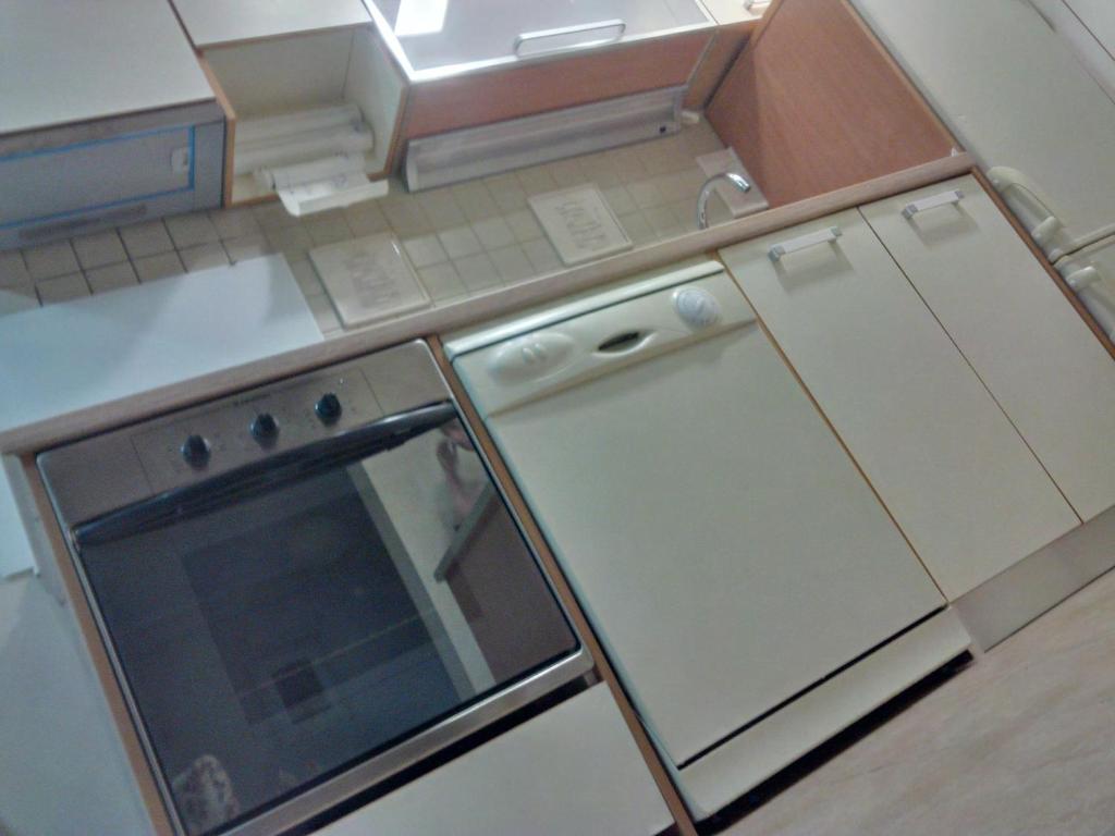 Kuchyňa alebo kuchynka v ubytovaní Apartment Gold & Gray