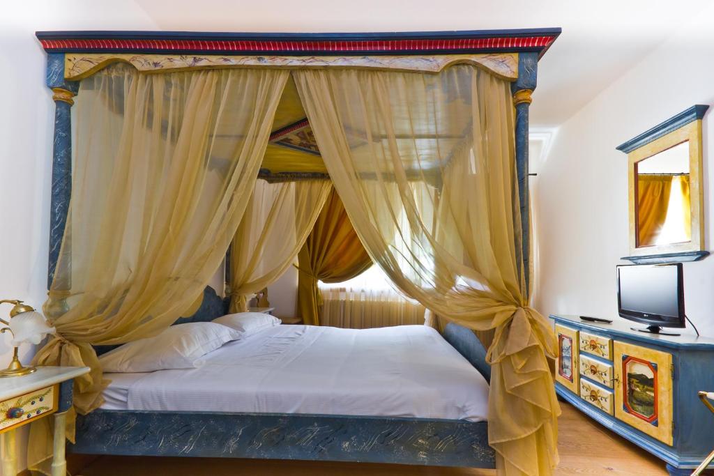 Postel nebo postele na pokoji v ubytování Hotel Edelhof
