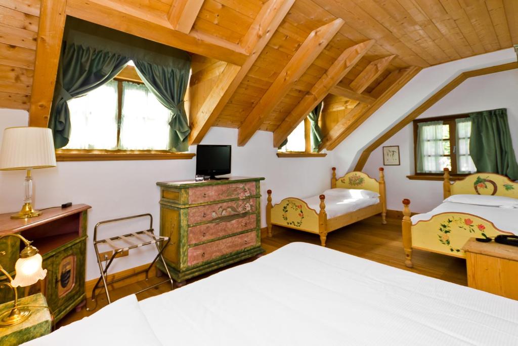 Postel nebo postele na pokoji v ubytování Hotel Edelhof