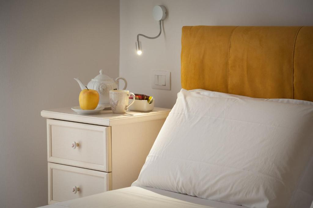 Postel nebo postele na pokoji v ubytování B&B Donnantonietta - Nobile dimora