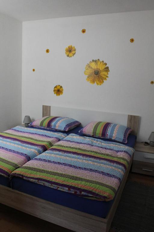 Postel nebo postele na pokoji v ubytování Alpes