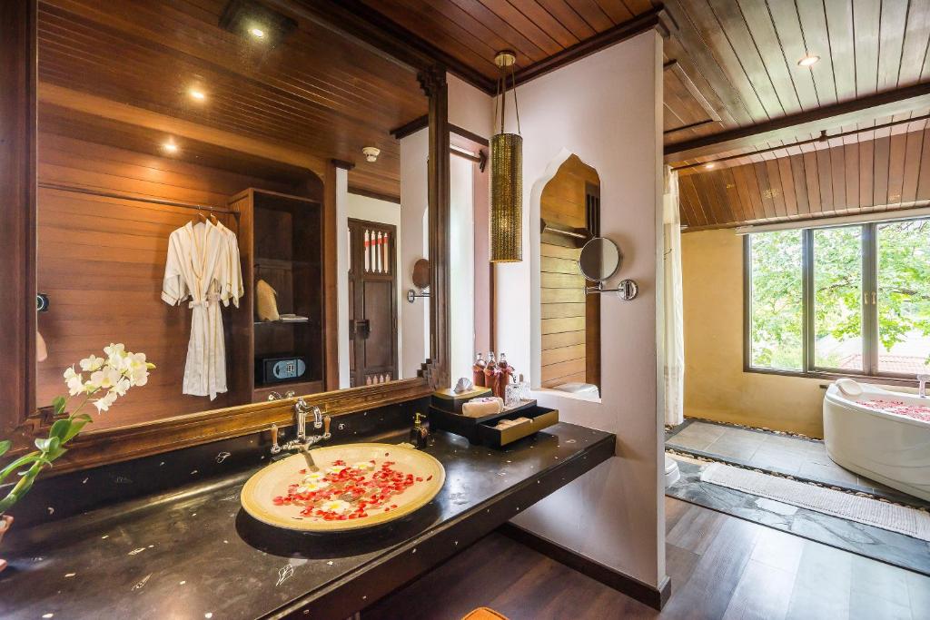 Koupelna v ubytování Muang Samui Spa Resort - SHA Extra Plus