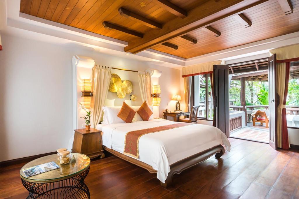 Postel nebo postele na pokoji v ubytování Muang Samui Spa Resort - SHA Extra Plus