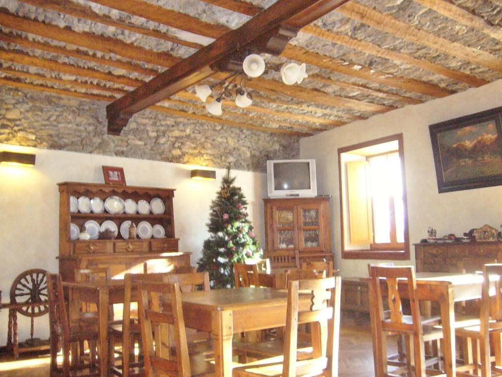 TV a/nebo společenská místnost v ubytování Albergo Passet
