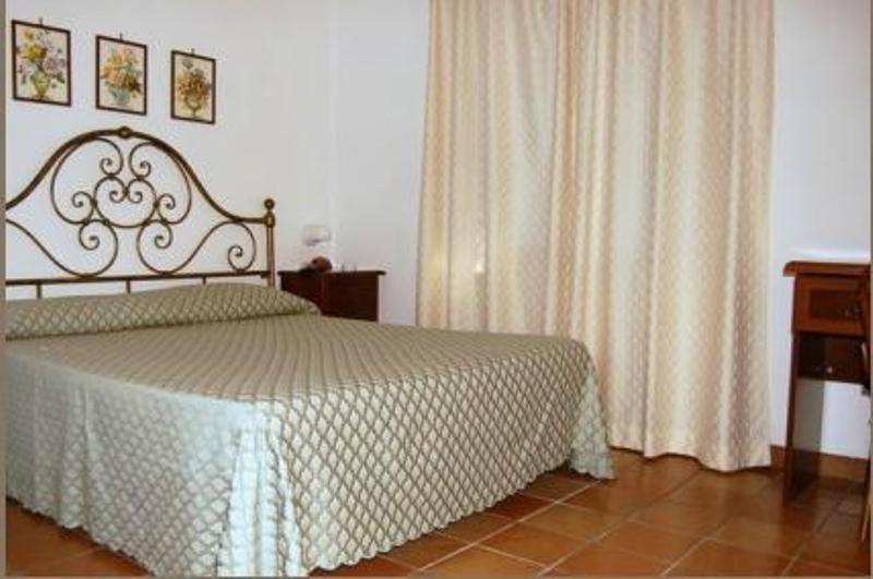 Postel nebo postele na pokoji v ubytování Albergo Belvedere