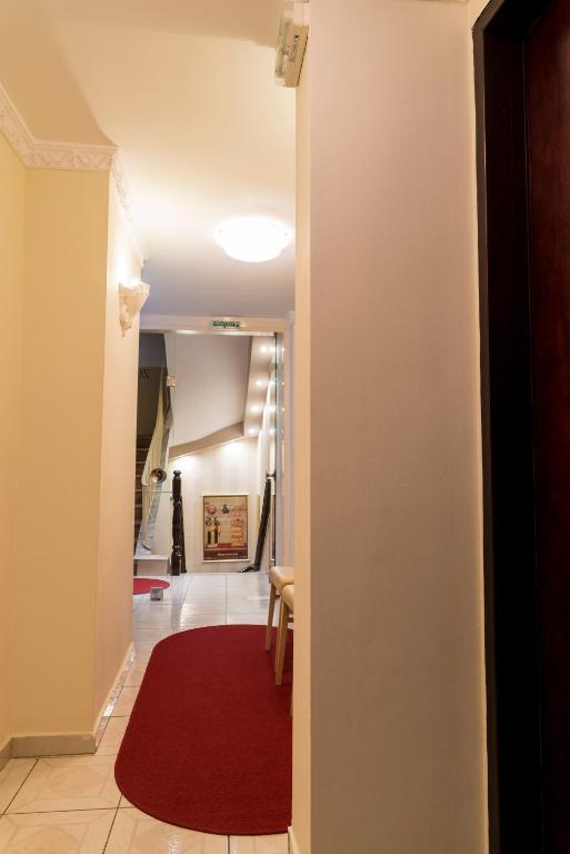Postel nebo postele na pokoji v ubytování Hotel Zografos