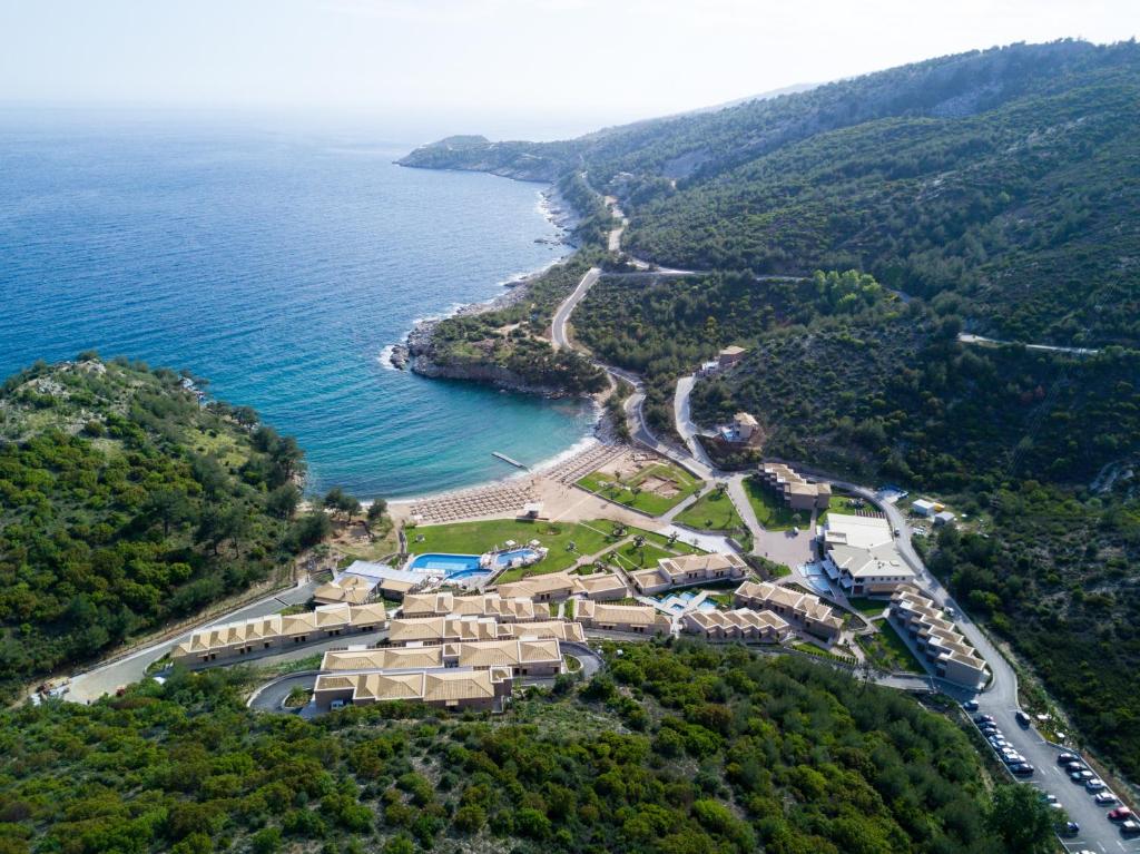 an aerial view of a resort next to the ocean at Thassos Grand Resort in Alyki