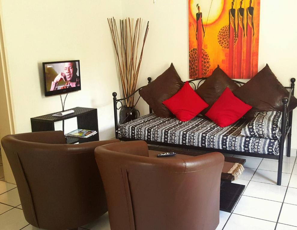 TV a/nebo společenská místnost v ubytování Sunshine Self Catering