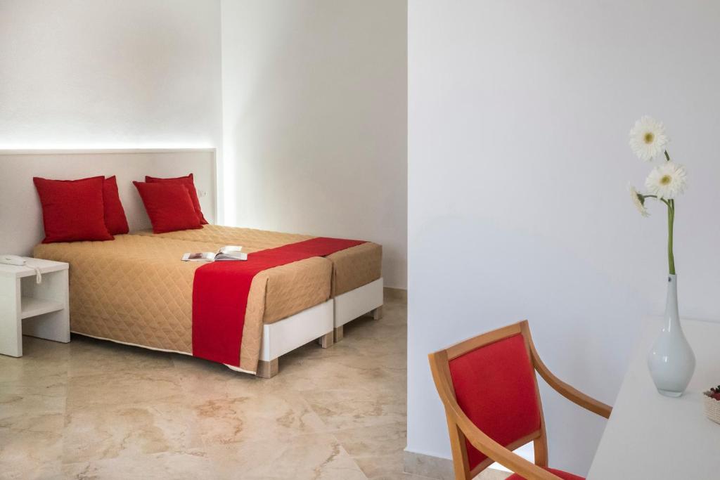 Postel nebo postele na pokoji v ubytování Palazzo Della Mura
