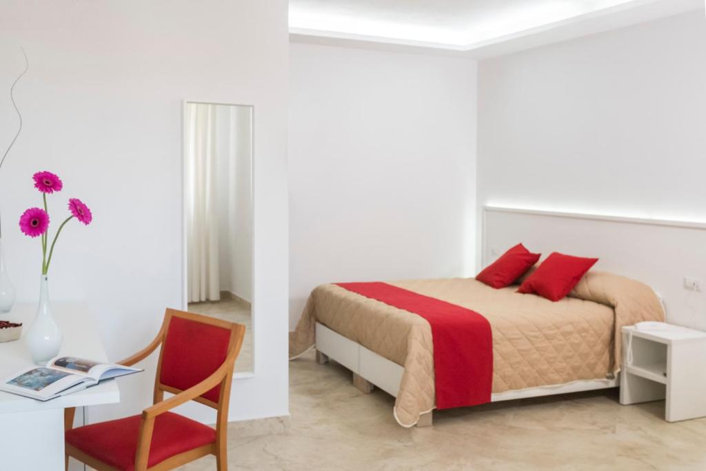 Postel nebo postele na pokoji v ubytování Palazzo Della Mura