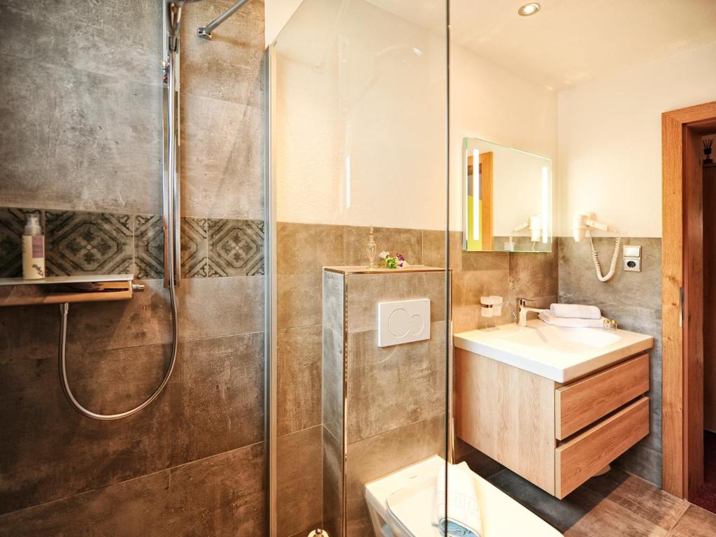 Koupelna v ubytování Appartements & Chalets Wiesenruh