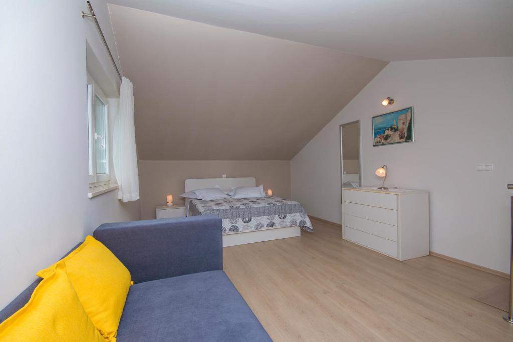 Posteľ alebo postele v izbe v ubytovaní Sea View Apartment Gin Brela