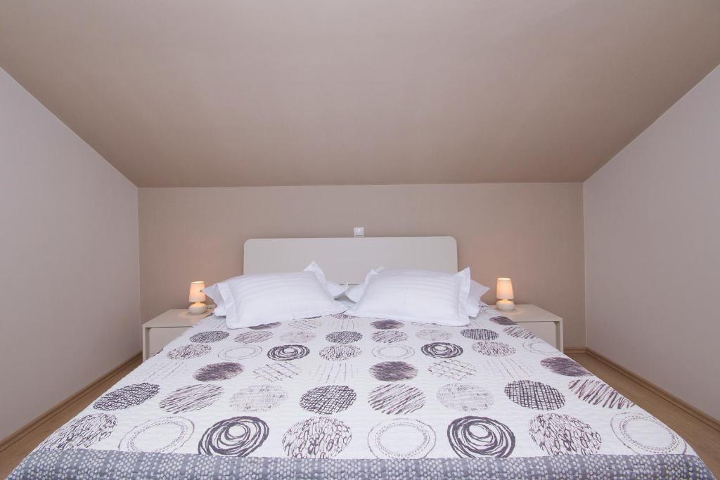 Posteľ alebo postele v izbe v ubytovaní Sea View Apartment Gin Brela