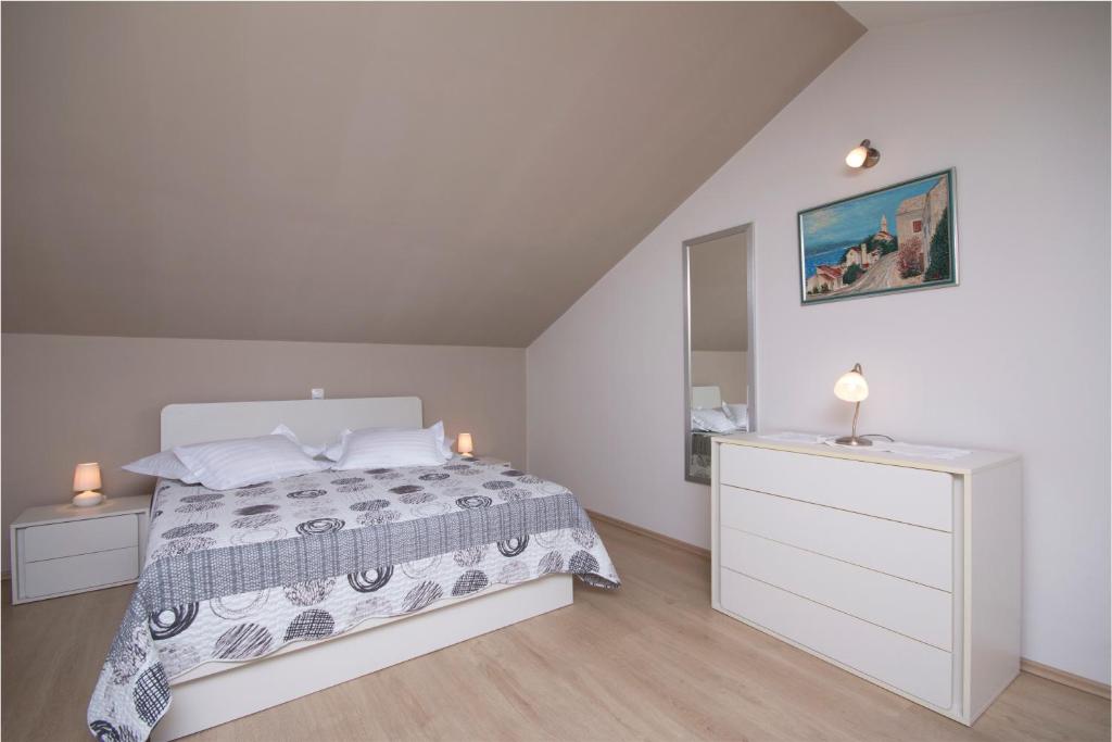 Posteľ alebo postele v izbe v ubytovaní Sea View Apartment Gin Brela