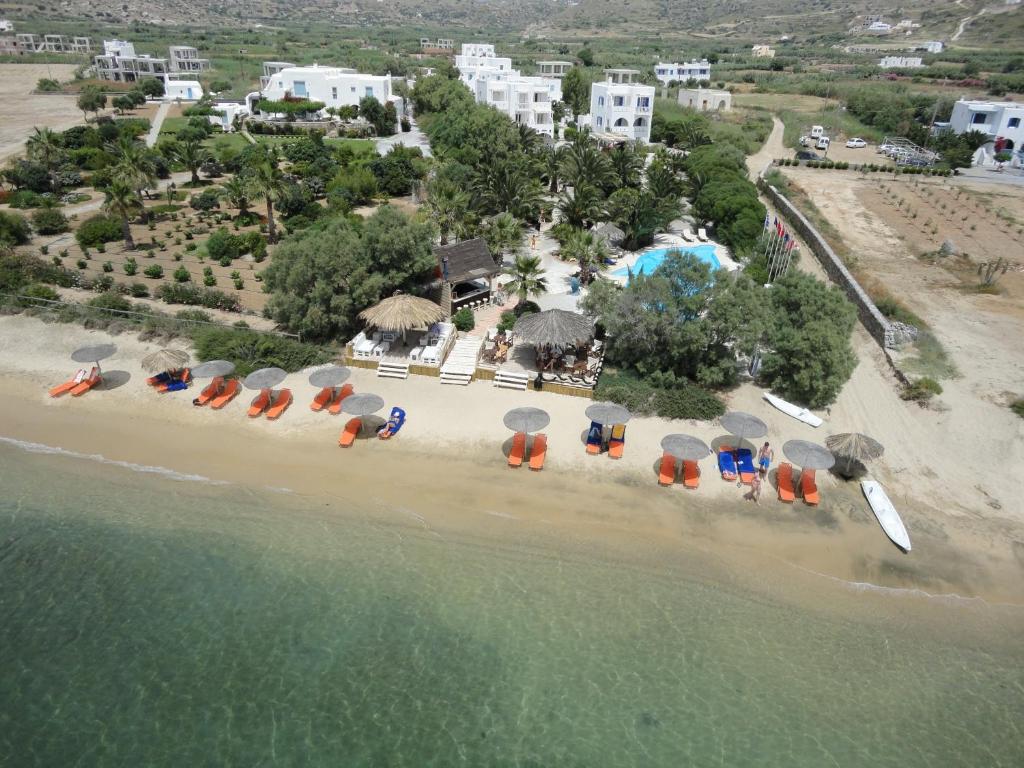 an aerial view of a beach with umbrellas at Medusa Beach Resort & Suites in Plaka