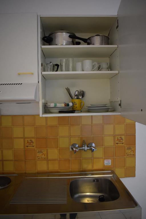 Kuchyň nebo kuchyňský kout v ubytování Gorgona apartments & studios