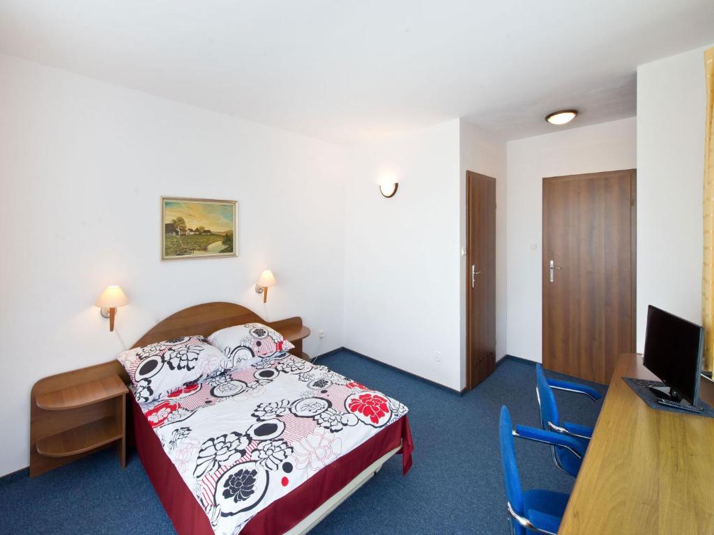 Postel nebo postele na pokoji v ubytování La Residence Kasandra