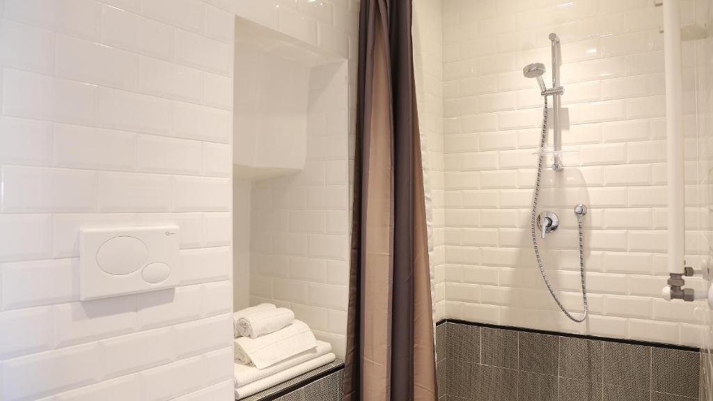 Koupelna v ubytování Intervallo Boutique Hotel