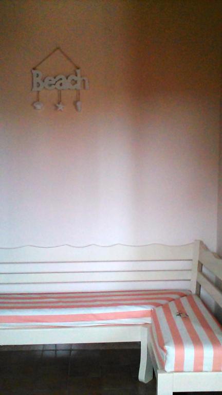 Postel nebo postele na pokoji v ubytování Gorgona apartments & studios