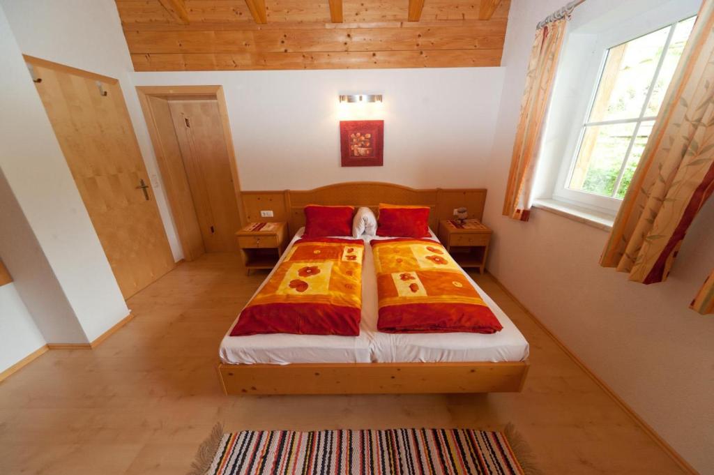 Postel nebo postele na pokoji v ubytování Haus Taumberger