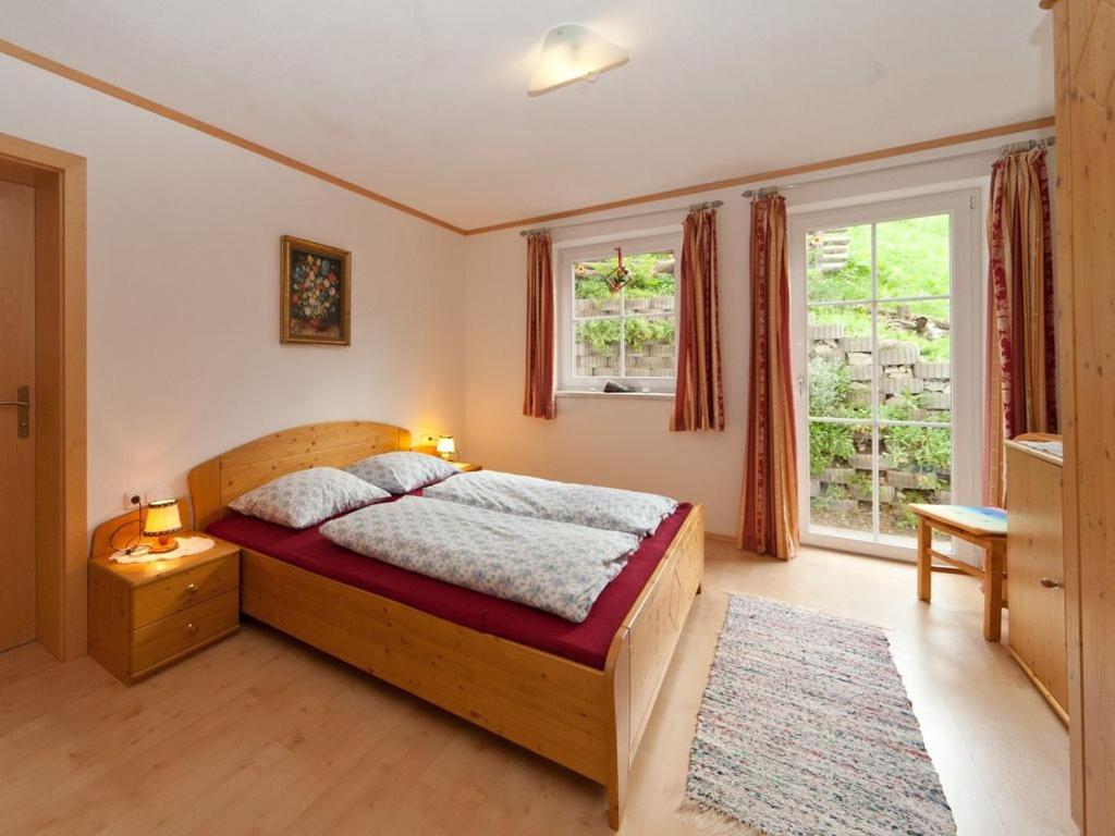 Postel nebo postele na pokoji v ubytování Haus Taumberger