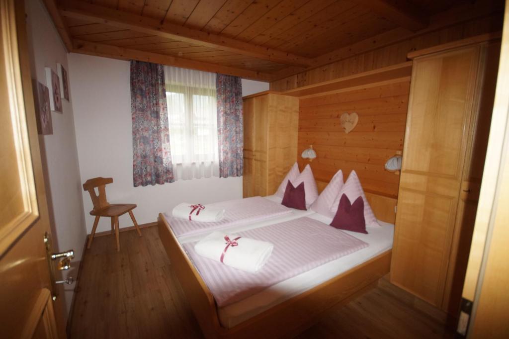 Postel nebo postele na pokoji v ubytování Landhaus Christophorus