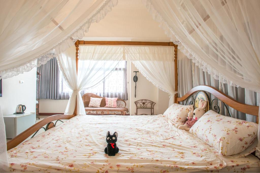 Postel nebo postele na pokoji v ubytování Fullmoon Sea B&B