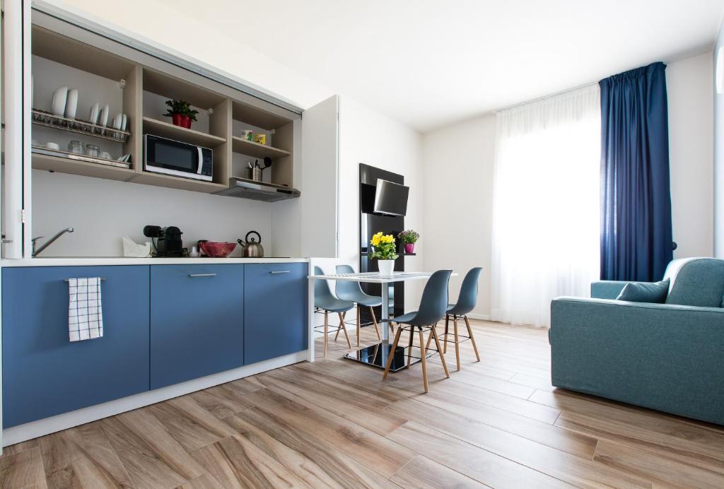 Kuchyň nebo kuchyňský kout v ubytování Aparthotel Isola