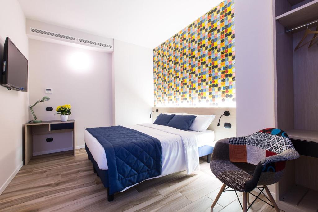 Postel nebo postele na pokoji v ubytování Aparthotel Isola