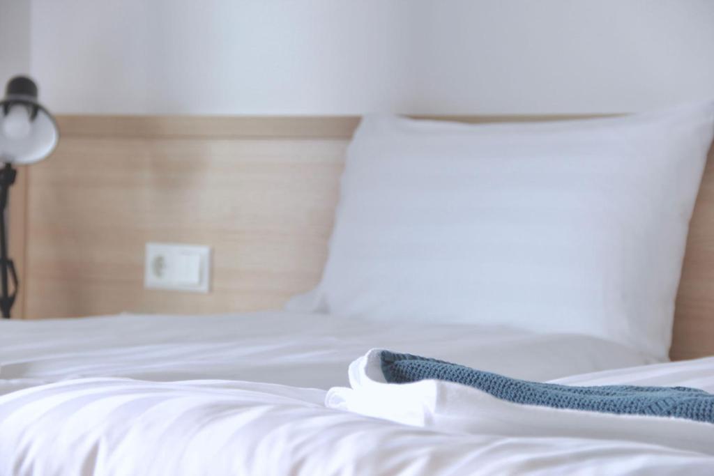 Postel nebo postele na pokoji v ubytování Lilja Guesthouse