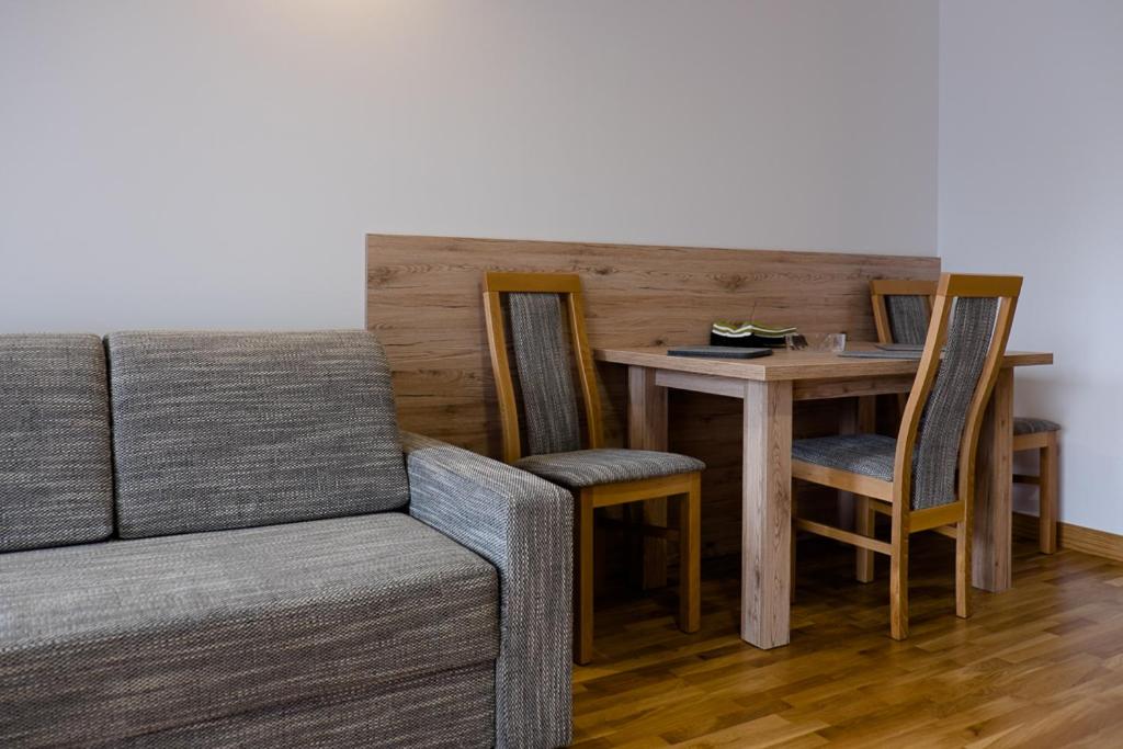 Posedenie v ubytovaní Apartament Wiślany Sen
