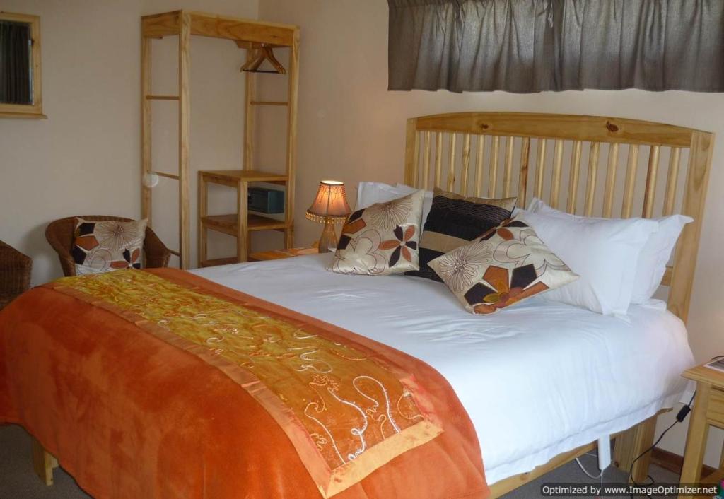 Postel nebo postele na pokoji v ubytování Colesview Guest House