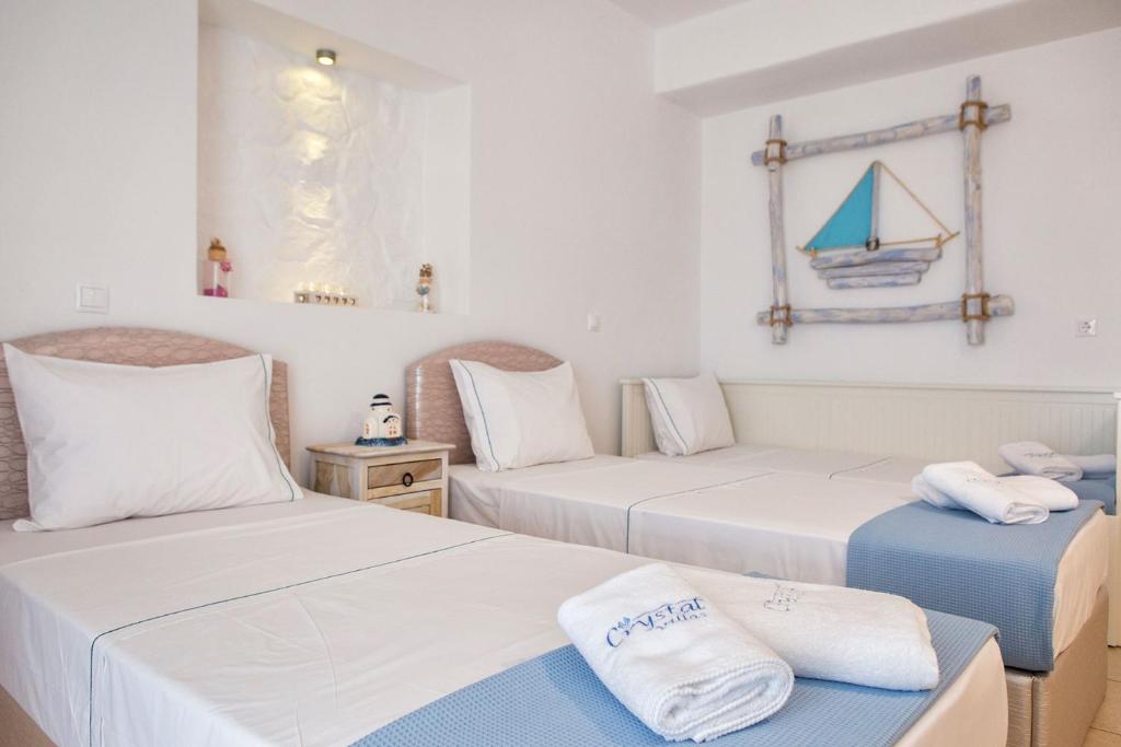 Posteľ alebo postele v izbe v ubytovaní Crystal Villa I