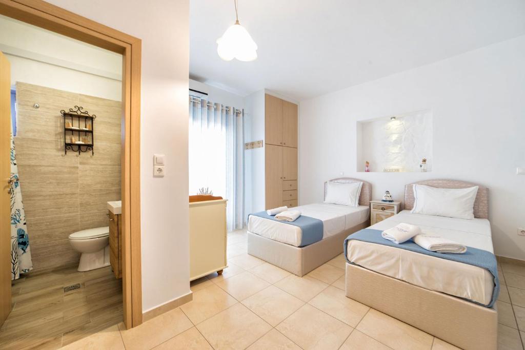 Posteľ alebo postele v izbe v ubytovaní Crystal Villa I