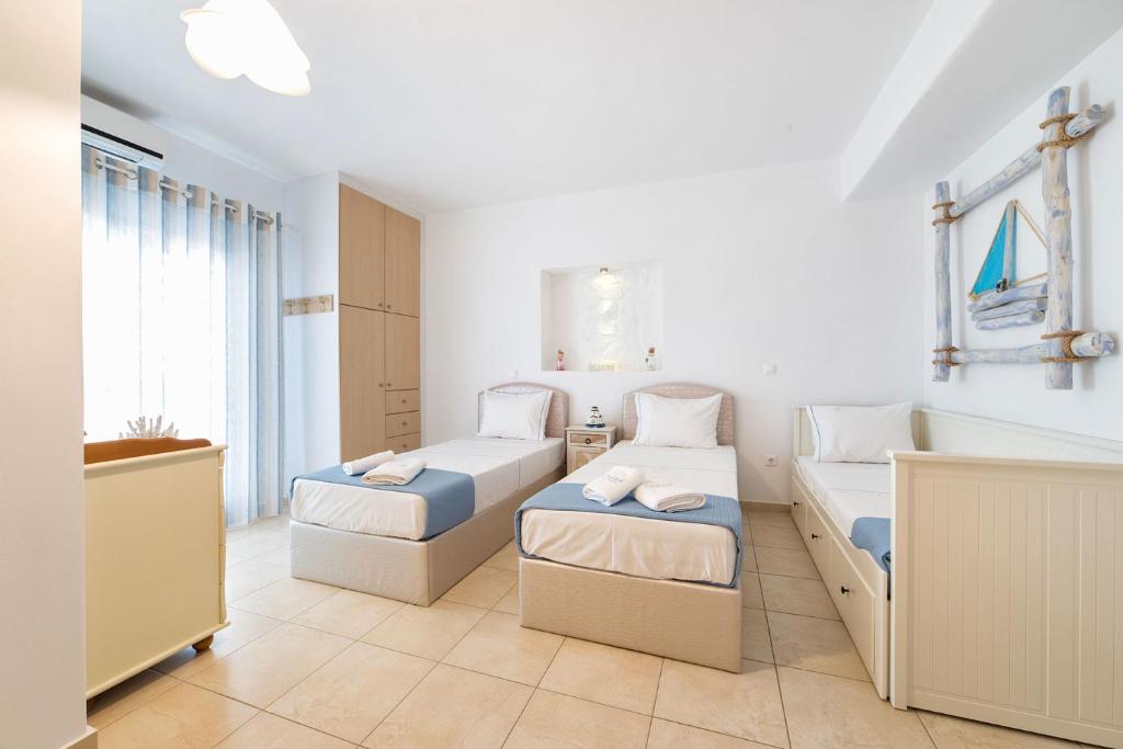 Posteľ alebo postele v izbe v ubytovaní Crystal Villa I