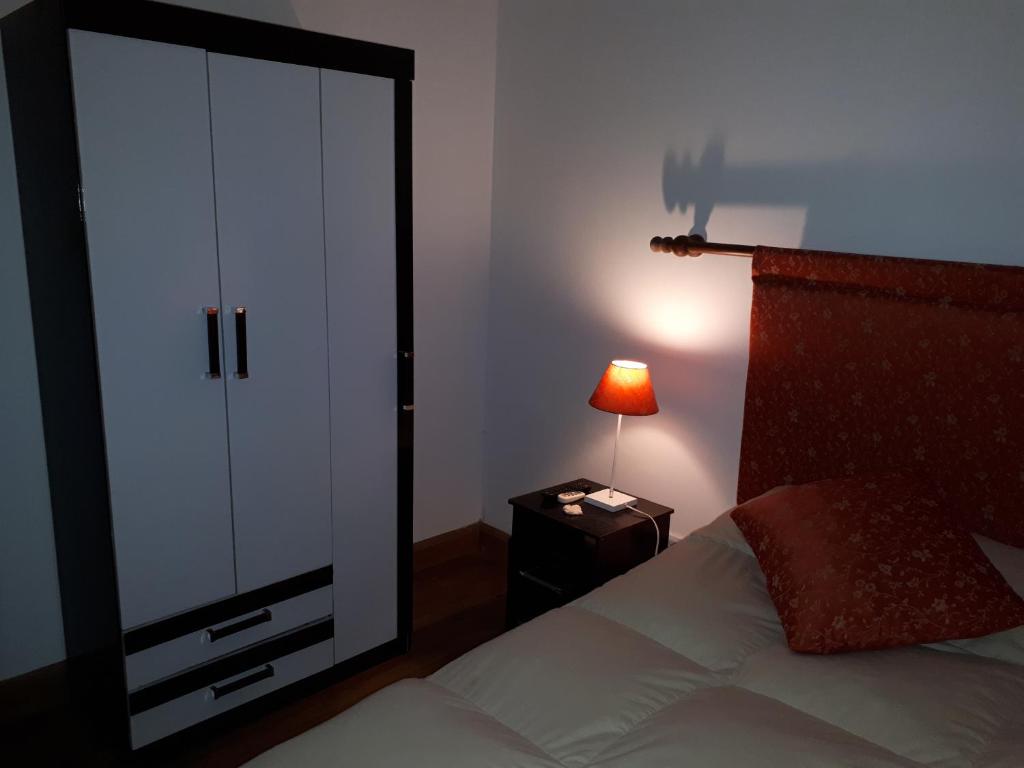 Postel nebo postele na pokoji v ubytování Posada del Angel