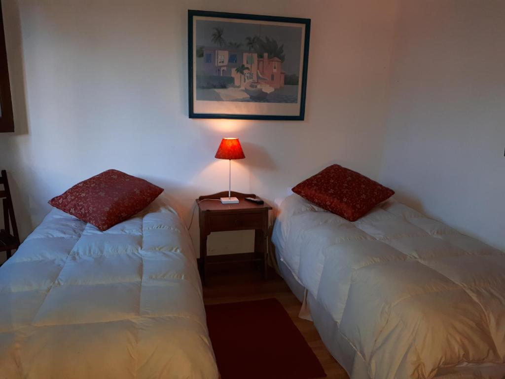 Postel nebo postele na pokoji v ubytování Posada del Angel