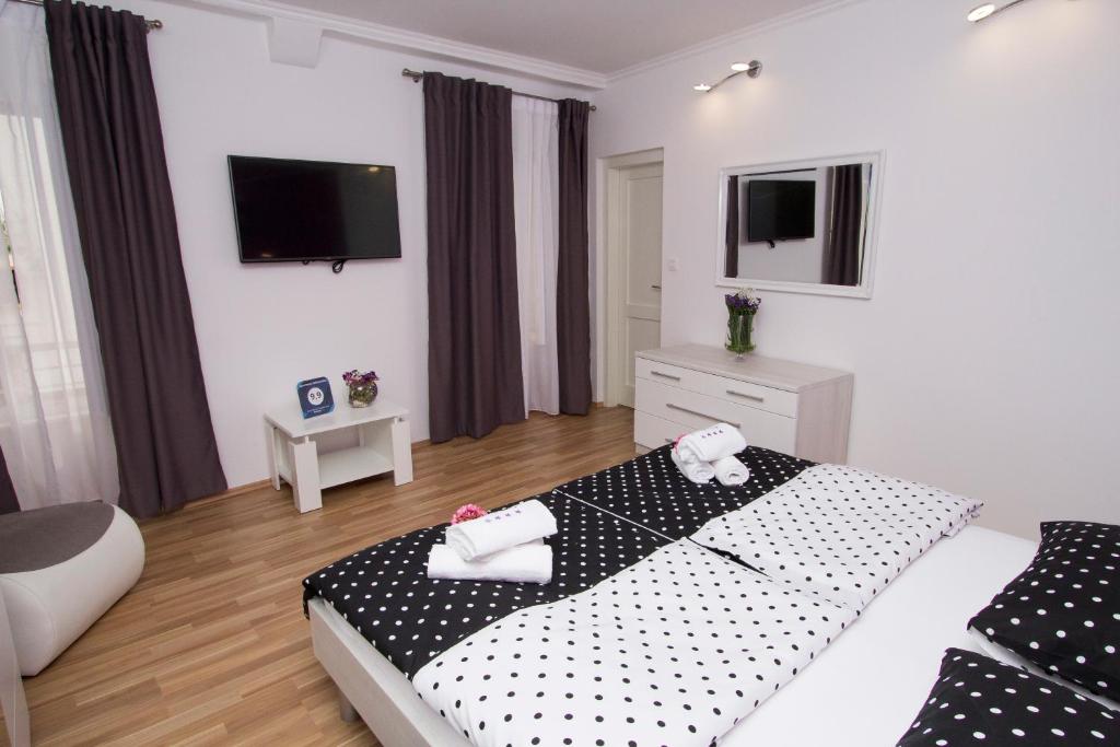 Posteľ alebo postele v izbe v ubytovaní Apartment Sabioncello