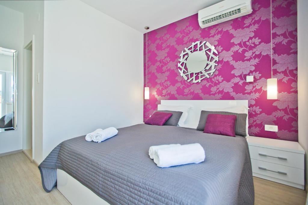 Postel nebo postele na pokoji v ubytování Violeta Hvar