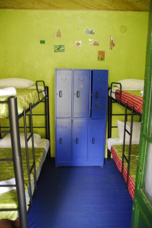 Palanda nebo palandy na pokoji v ubytování Hostal Gastro Bar Casa Colibrí