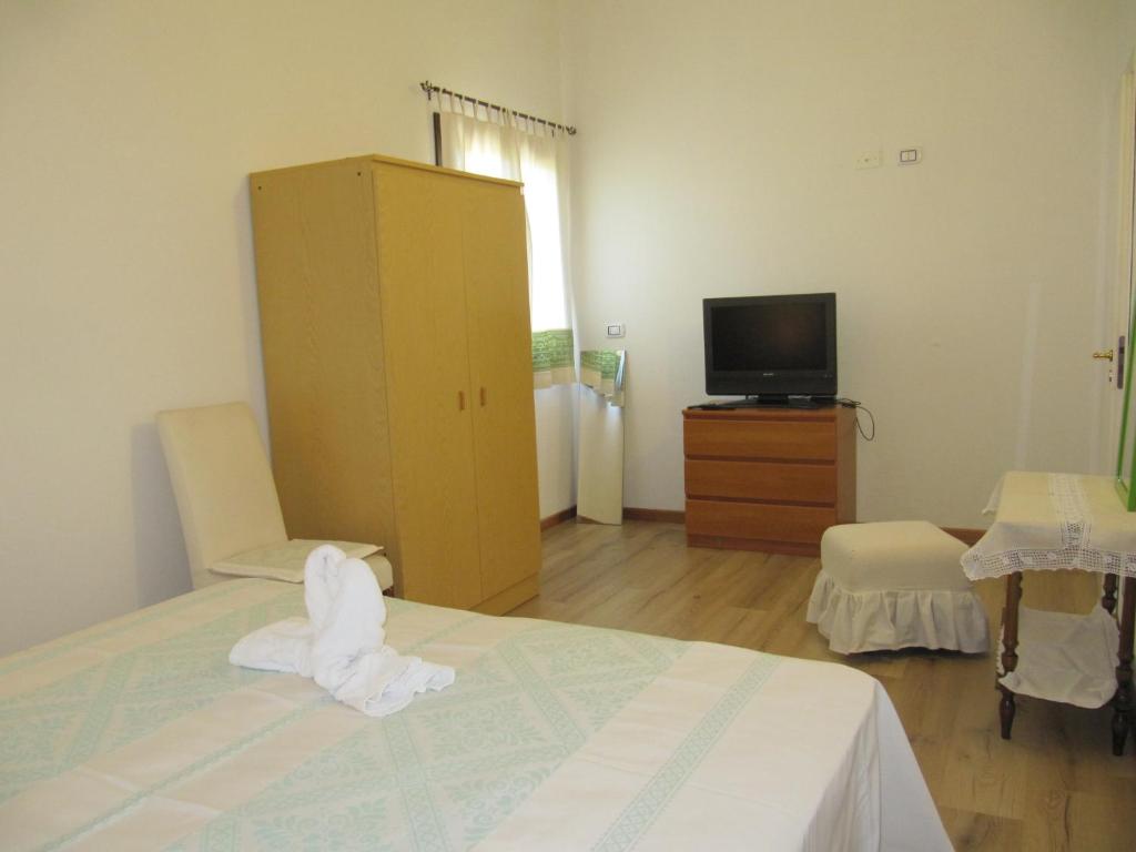 Postel nebo postele na pokoji v ubytování B&B I Limoni